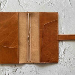 Belt closure cover for Travelers’