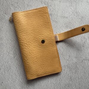 Nip & snap closure cover for Travelers’