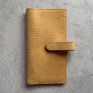 Nip & snap closure cover for Travelers’