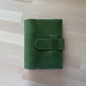 Pocket rings cover with chunky belt closure