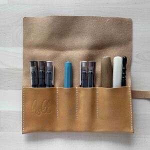 Leather pen roll with buckle