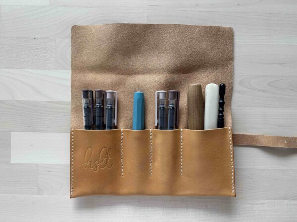 Leather pen roll with buckle
