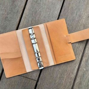 A6 / Personal rings cover with chunky belt closure