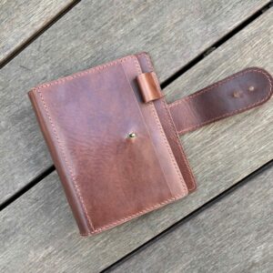 Pocket rings cover with nip & snap closure