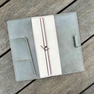 Folio cover for Travelers’